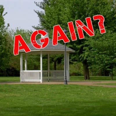 Gazebo in a park with "Again?" in the foreground